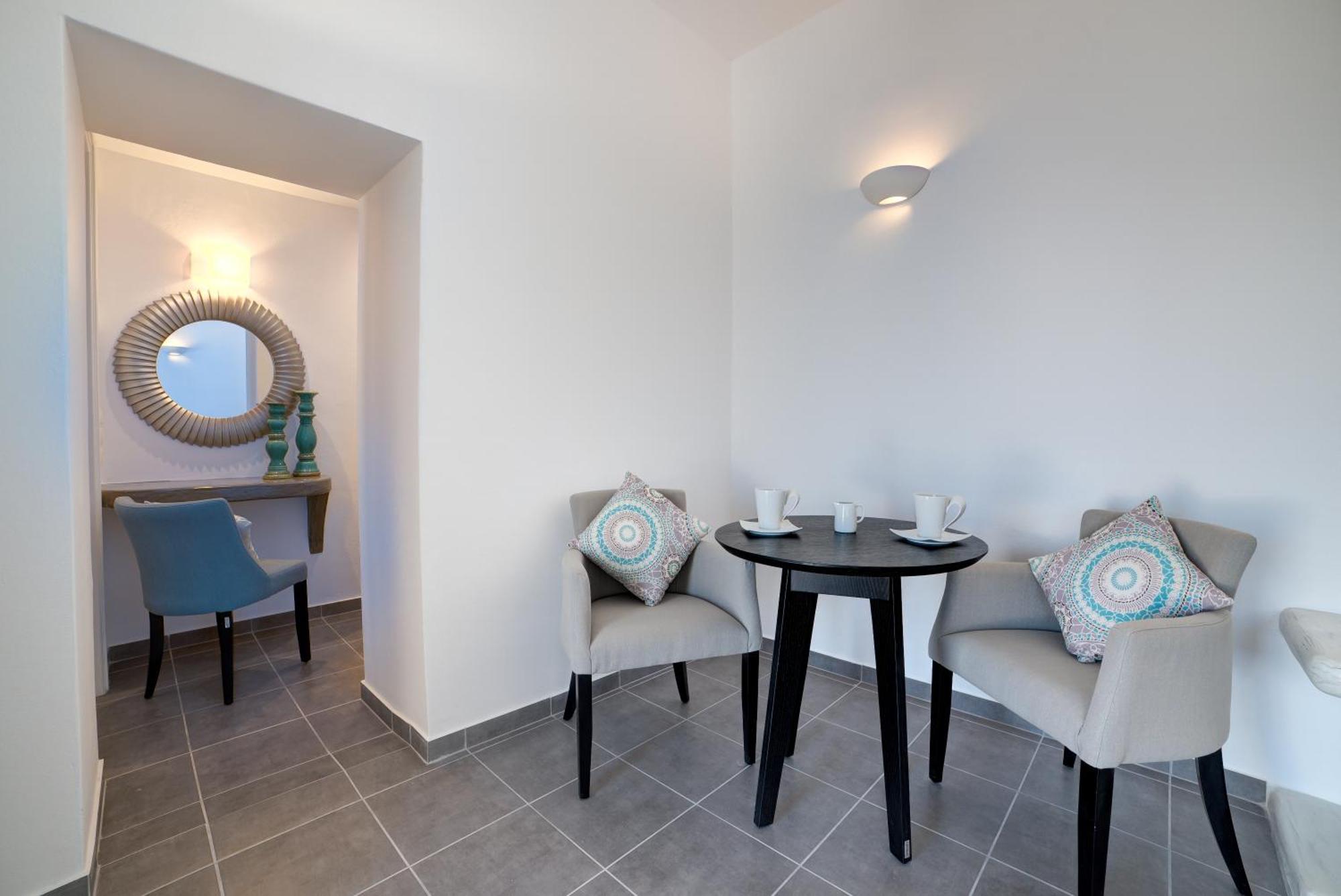 Remvi Suites Фіростефані Номер фото